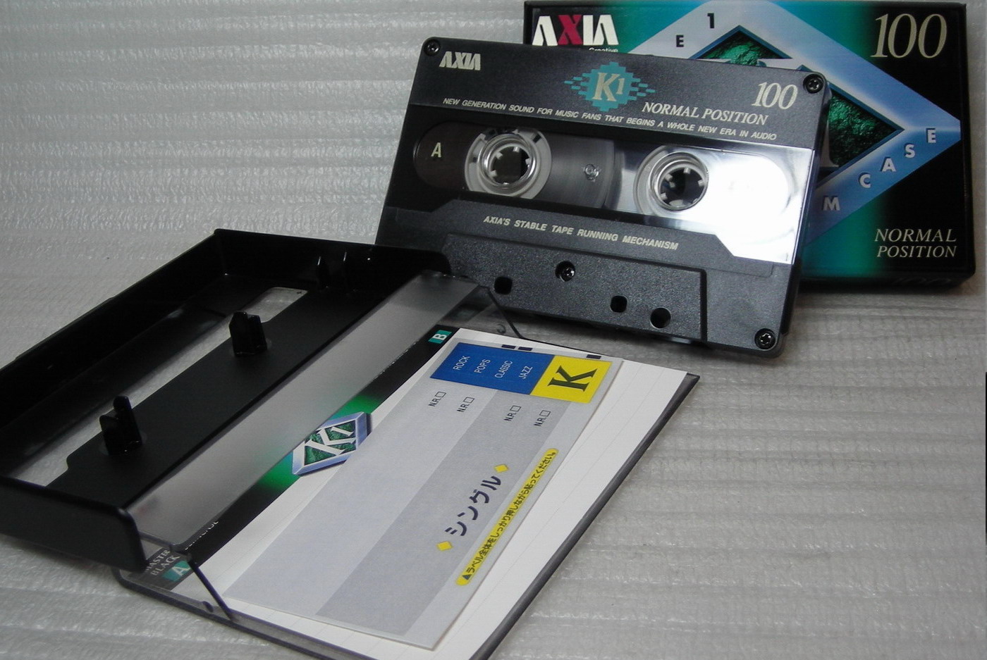 Качество кассет. Аудиокассета Axia k1 100. Аудиокассета Axia a1 60. Магнитофон Axia. Axia 120.